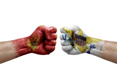 Two hands punch to each others on white background. Country flags painted fists, conflict crisis concept between montenegro and virgin islands