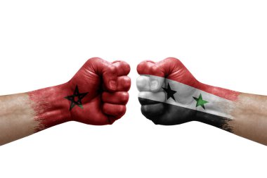 Two hands punch to each others on white background. Country flags painted fists, conflict crisis concept between morocco and syria