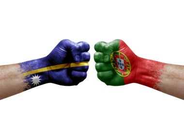 Two hands punch to each others on white background. Country flags painted fists, conflict crisis concept between nauru and portugal
