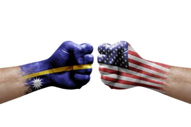 Two hands punch to each others on white background. Country flags painted fists, conflict crisis concept between nauru and usa