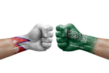 Two hands punch to each others on white background. Country flags painted fists, conflict crisis concept between nepal and saudi arabia