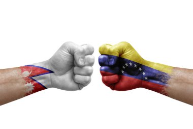 Two hands punch to each others on white background. Country flags painted fists, conflict crisis concept between nepal and venezuela
