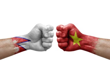 Two hands punch to each others on white background. Country flags painted fists, conflict crisis concept between nepal and vietnam