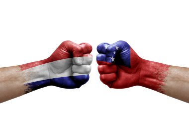 Two hands punch to each others on white background. Country flags painted fists, conflict crisis concept between netherlands and samoa