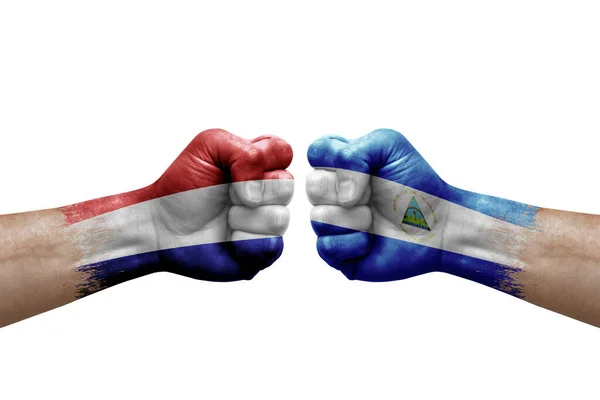 Two Hands Punch Each Others White Background Country Flags Painted — Stockfoto