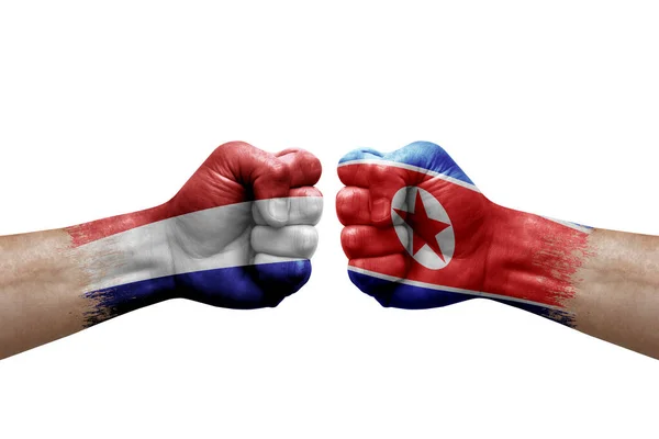 Two Hands Punch Each Others White Background Country Flags Painted - Stock-foto