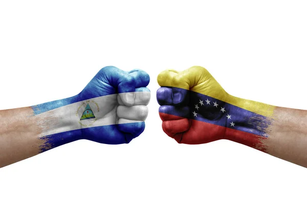 Two Hands Punch Each Others White Background Country Flags Painted – stockfoto