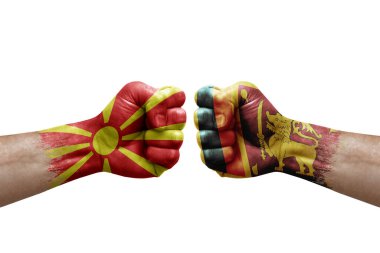 Two hands punch to each others on white background. Country flags painted fists, conflict crisis concept between north macedonia and sri lanka