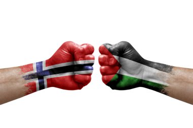 Two hands punch to each others on white background. Country flags painted fists, conflict crisis concept between norway and palestine