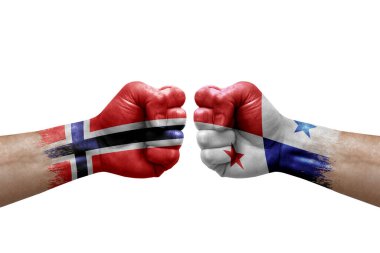 Two hands punch to each others on white background. Country flags painted fists, conflict crisis concept between norway and panama