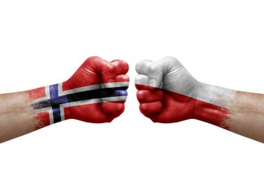 Two hands punch to each others on white background. Country flags painted fists, conflict crisis concept between norway and poland