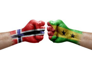 Two hands punch to each others on white background. Country flags painted fists, conflict crisis concept between norway and sao tome and principe