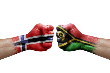 Two hands punch to each others on white background. Country flags painted fists, conflict crisis concept between norway and vanuatu