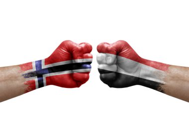 Two hands punch to each others on white background. Country flags painted fists, conflict crisis concept between norway and yemen