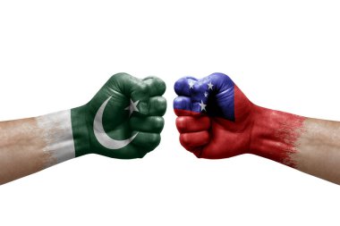Two hands punch to each others on white background. Country flags painted fists, conflict crisis concept between pakistan and samoa