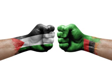 Two hands punch to each others on white background. Country flags painted fists, conflict crisis concept between palestine and zambia