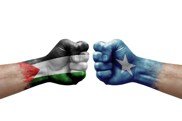 Two Hands Punch Each Others White Background Country Flags Painted — Fotografia de Stock