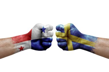 Two hands punch to each others on white background. Country flags painted fists, conflict crisis concept between panama and sweden