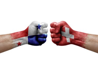 Two hands punch to each others on white background. Country flags painted fists, conflict crisis concept between panama and switzerland