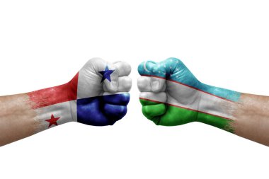 Two hands punch to each others on white background. Country flags painted fists, conflict crisis concept between panama and uzbekistan