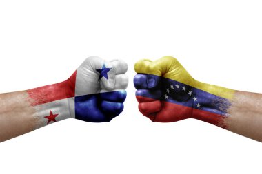 Two hands punch to each others on white background. Country flags painted fists, conflict crisis concept between panama and venezuela