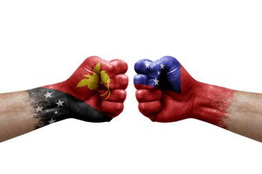 Two hands punch to each others on white background. Country flags painted fists, conflict crisis concept between papua new guinea and samoa