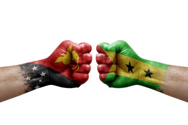 Two hands punch to each others on white background. Country flags painted fists, conflict crisis concept between papua new guinea and sao tome and principe