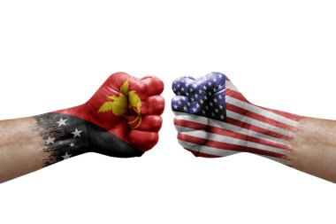 Two hands punch to each others on white background. Country flags painted fists, conflict crisis concept between papua new guinea and usa