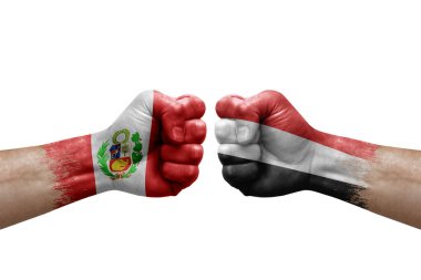 Two hands punch to each others on white background. Country flags painted fists, conflict crisis concept between peru and yemen