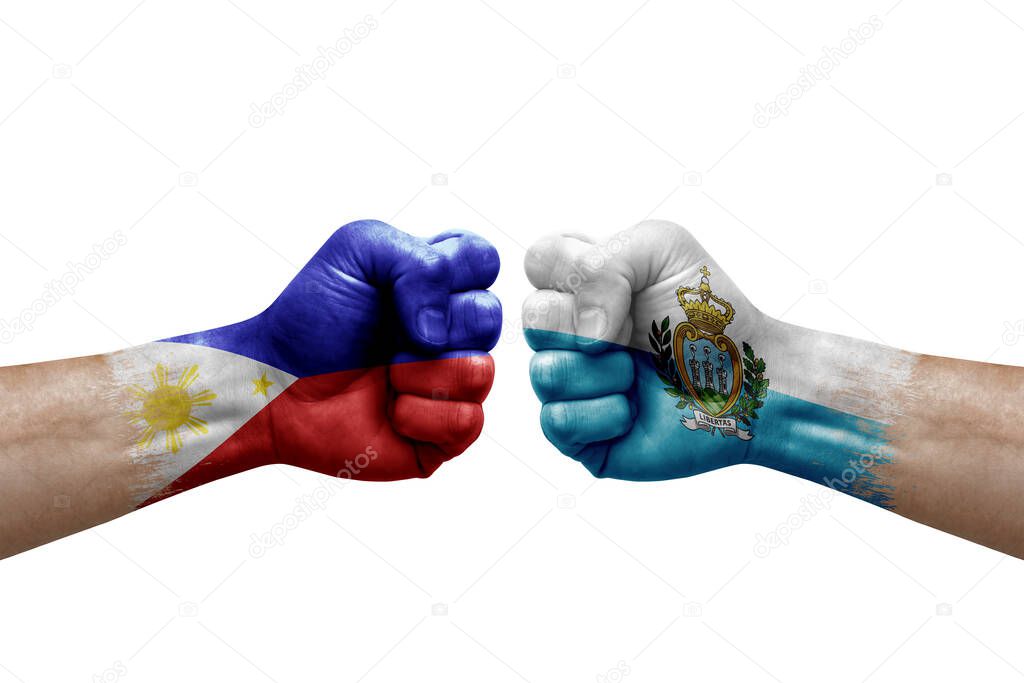 Two hands punch to each others on white background. Country flags painted fists, conflict crisis concept between philippines and san marino