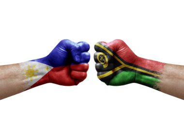 Two hands punch to each others on white background. Country flags painted fists, conflict crisis concept between philippines and vanuatu