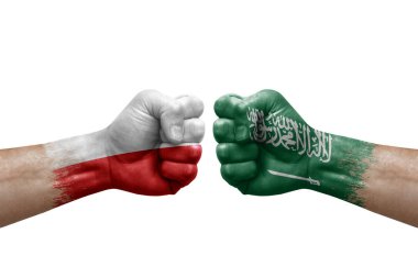 Two hands punch to each others on white background. Country flags painted fists, conflict crisis concept between poland and saudi arabia