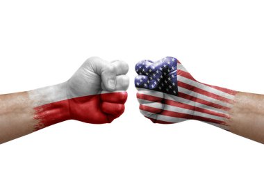 Two hands punch to each others on white background. Country flags painted fists, conflict crisis concept between poland and usa
