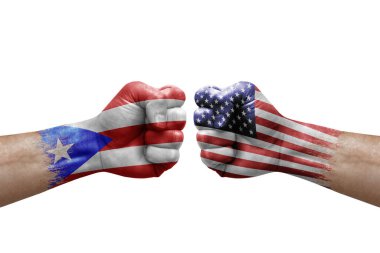 Two hands punch to each others on white background. Country flags painted fists, conflict crisis concept between puerto rico and usa