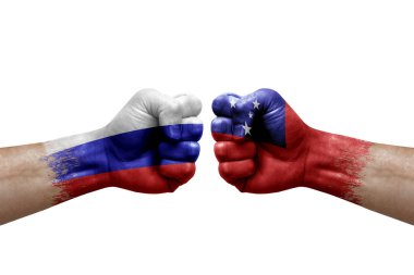 Two hands punch to each others on white background. Country flags painted fists, conflict crisis concept between russia and samoa