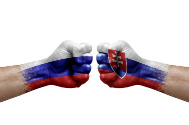 Two hands punch to each others on white background. Country flags painted fists, conflict crisis concept between russia and slovakia