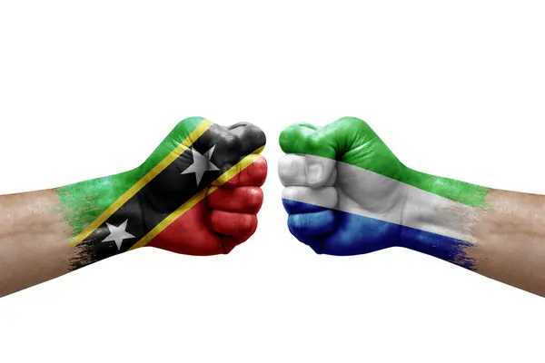 Two Hands Punch Each Others White Background Country Flags Painted — Stok fotoğraf