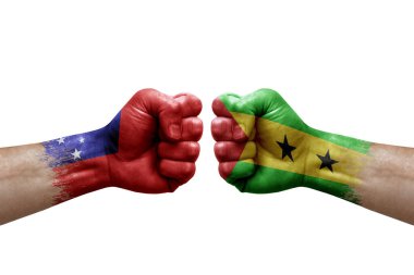 Two hands punch to each others on white background. Country flags painted fists, conflict crisis concept between samoa and sao tome and principe