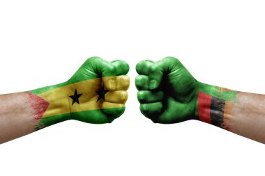 Two hands punch to each others on white background. Country flags painted fists, conflict crisis concept between sao tome and principe and zambia