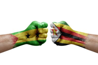 Two hands punch to each others on white background. Country flags painted fists, conflict crisis concept between sao tome and principe and zimbabwe