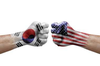 Two hands punch to each others on white background. Country flags painted fists, conflict crisis concept between south korea and usa