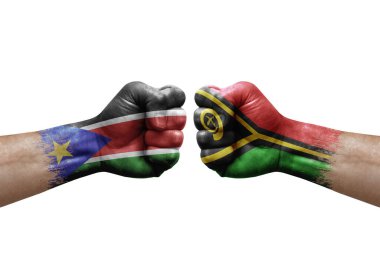 Two hands punch to each others on white background. Country flags painted fists, conflict crisis concept between south sudan and vanuatu