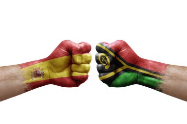 Two hands punch to each others on white background. Country flags painted fists, conflict crisis concept between spain and vanuatu