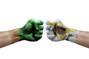 Two hands punch to each others on white background. Country flags painted fists, conflict crisis concept between turkmenistan and virgin islands
