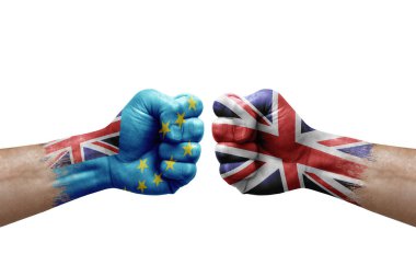 Two hands punch to each others on white background. Country flags painted fists, conflict crisis concept between tuvalu and united kingdom