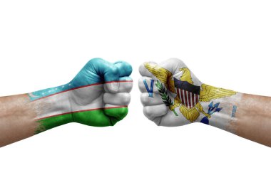 Two hands punch to each others on white background. Country flags painted fists, conflict crisis concept between uzbekistan and virgin islands