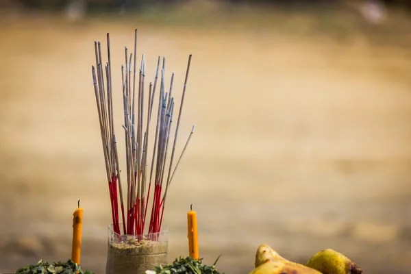 Candle and incense sticks. — Stock Photo, Image