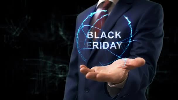 Podnikatel ukazuje koncept hologram černý pátek — Stock video