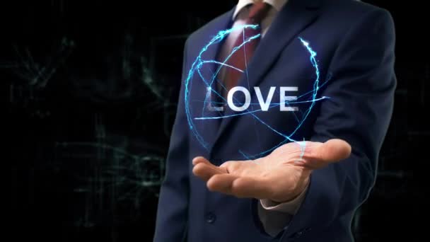 Businessman Shows Concept Hologram Love His Hand Man Business Suit — Stockvideo