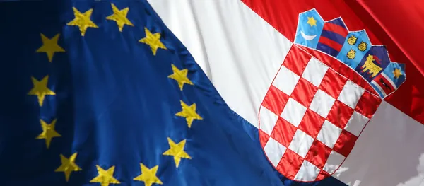 Close up of EU and Croatian flags — Stock Photo, Image